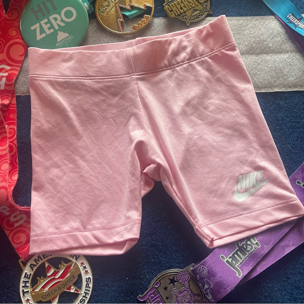 Light pink Nike shorts